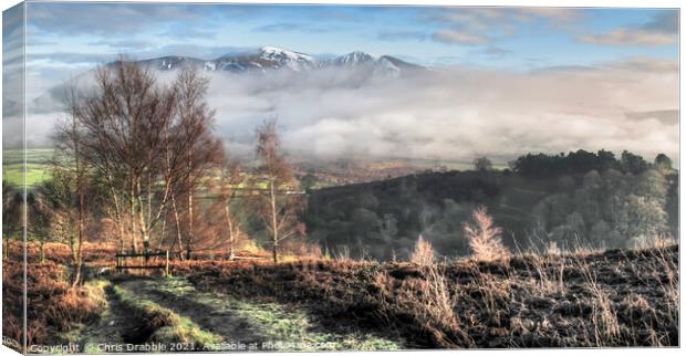 A snow capped Skiddaw from Grisedale Pike Canvas Print by Chris Drabble