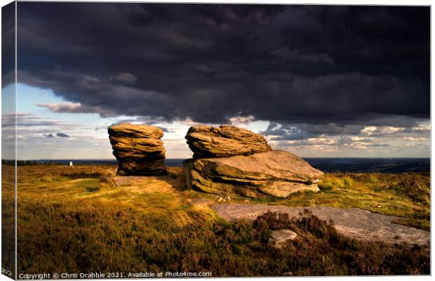 The Ox Stones caught in storm light Canvas Print by Chris Drabble