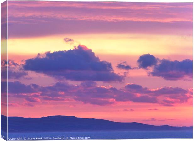 Fiery Storm Clouds at Sunrise over the Jurassic Co Canvas Print by Susie Peek