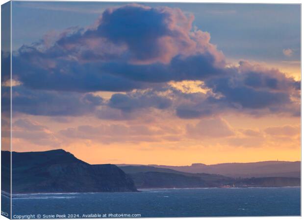 Fiery Storm Clouds at Sunrise over the Jurassic Coast Canvas Print by Susie Peek