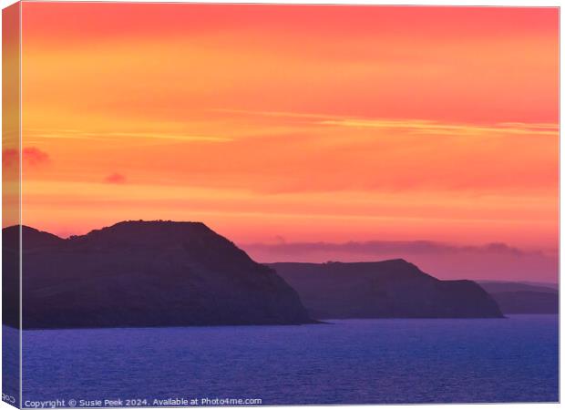 Fiery Dawn Clouds on an April Sunrise over the Jur Canvas Print by Susie Peek