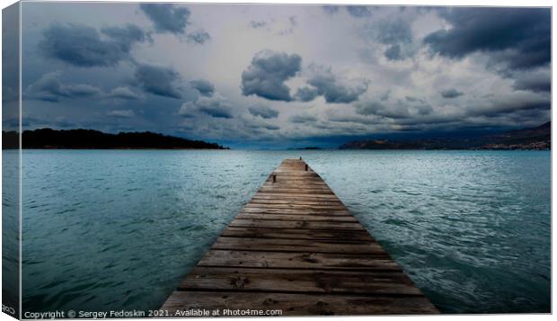 Wooden pier on the Adriatic sea. Stormy weather. Canvas Print by Sergey Fedoskin