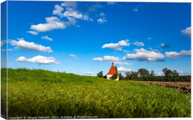 Old church in the summer field. Dobronice u Bechyne, Czech republic. Canvas Print by Sergey Fedoskin