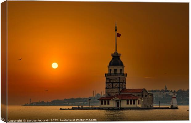 Maiden Tower (Kiz Kulesi) in Istanbul in the evening with sunset sky. Bosporus strait. Canvas Print by Sergey Fedoskin
