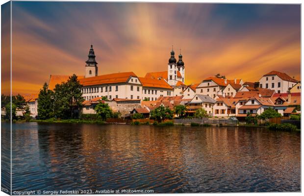 View of Telc across pond with reflections, South Moravia, Czech Republic. Canvas Print by Sergey Fedoskin
