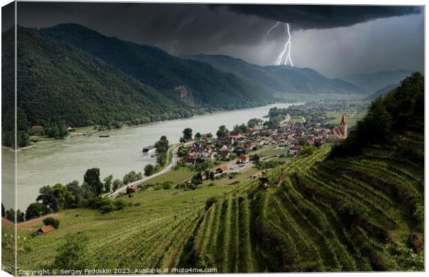 Thunderstorm with lightning over Weissenkirchen village. Canvas Print by Sergey Fedoskin