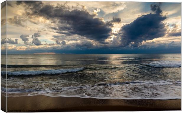 Coast of a sea and dramatic sky. Evening time.  Canvas Print by Sergey Fedoskin