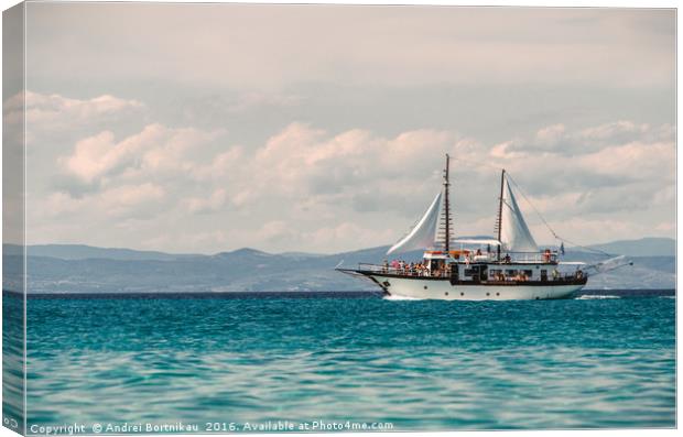 Sailing ship sails in the Aegean Sea Canvas Print by Andrei Bortnikau