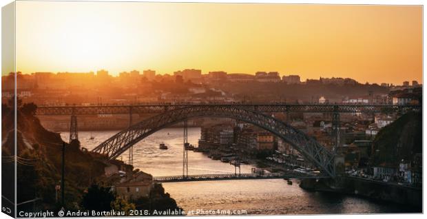 Dom Luis I Bridge in skyline at sunset in Porto Canvas Print by Andrei Bortnikau