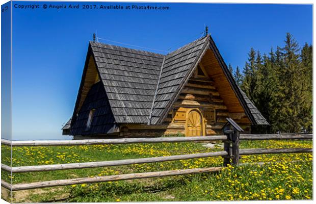 Wooden Home. Canvas Print by Angela Aird