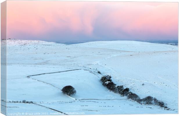 Dramatic pink sunrise on Dartmoor Canvas Print by Bruce Little