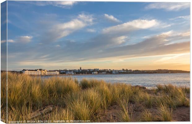 Golden Sunrise at Exmouth Seafront Canvas Print by Bruce Little