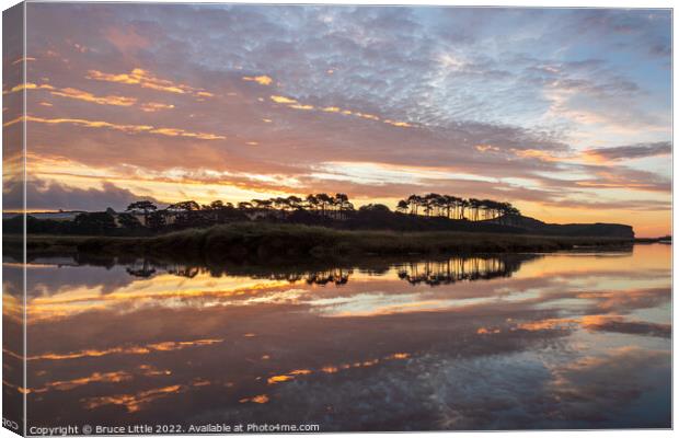 Dramatic sunrise at Budleigh Salterton Canvas Print by Bruce Little