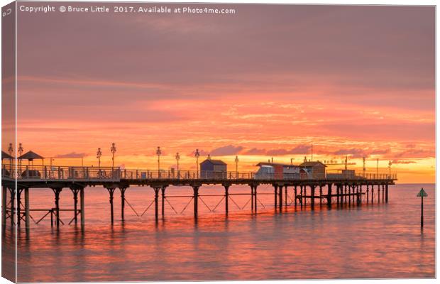 Fiery Dawn over Teignmouth Pier Canvas Print by Bruce Little