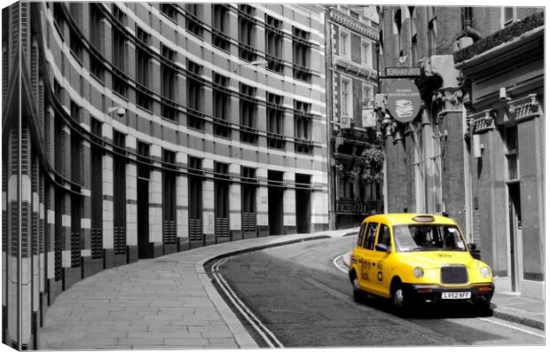 Yellow Taxi in London Canvas Print by Jim Hughes