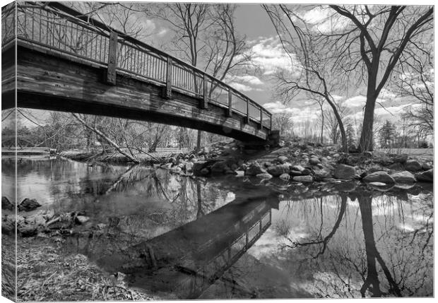 Minnehaha Creek in March Canvas Print by Jim Hughes