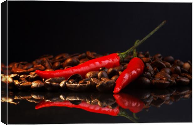 Black coffee and red chili in contrast  Canvas Print by Tanja Riedel