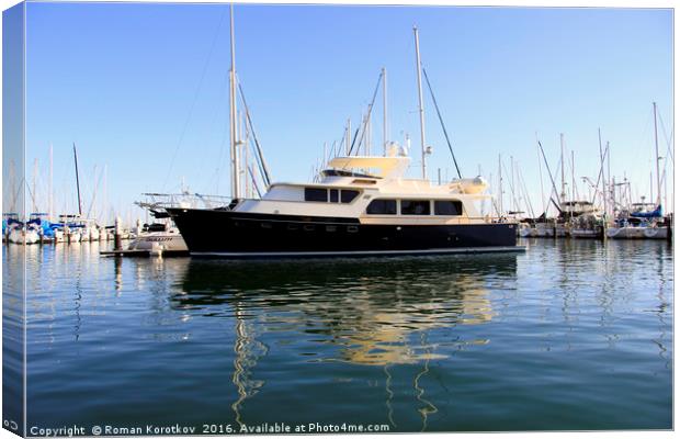 Black yachts in the port Canvas Print by Roman Korotkov