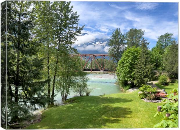 Washington State outdoor park showing bridge with Skykomish rive Canvas Print by Thomas Baker