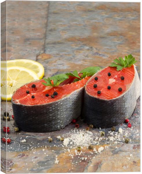 Fresh Raw Salmon Steaks ready for cooking  Canvas Print by Thomas Baker