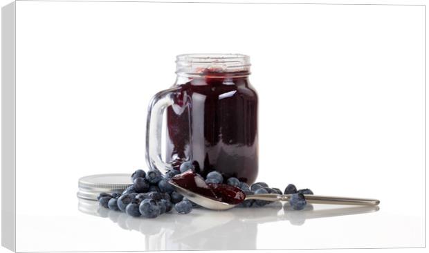 Fresh blueberry jam and berries with glass jar iso Canvas Print by Thomas Baker