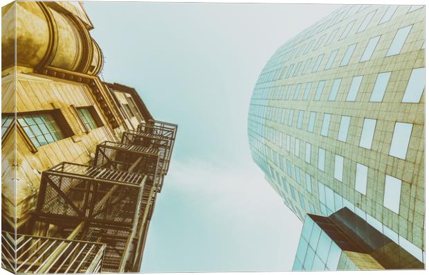 Old Versus New Architecture Canvas Print by Radu Bercan