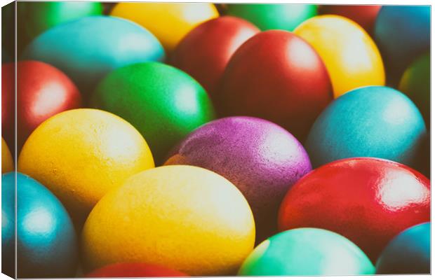 Colorful Easter Eggs In Basket Canvas Print by Radu Bercan