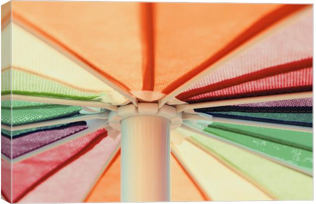 Rainbow Colored Umbrella Canvas Print by Radu Bercan
