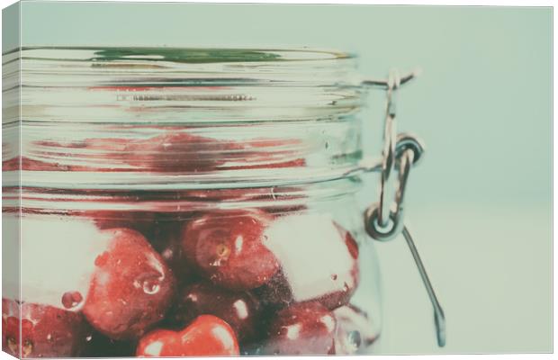 Jar Of Red Fresh Cherries Canvas Print by Radu Bercan