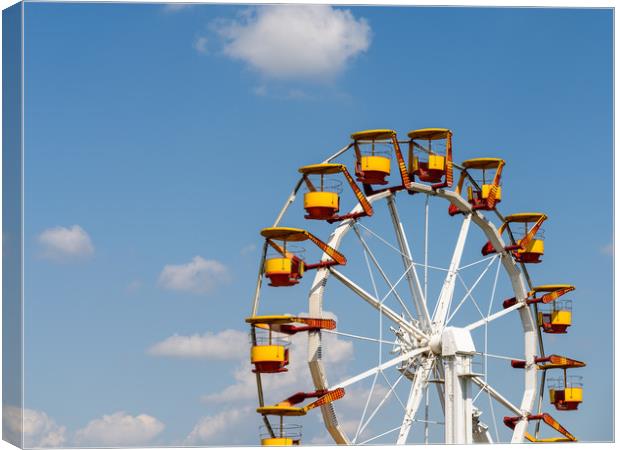 Giant Ferris Wheel In Fun Park On Blue Sky Canvas Print by Radu Bercan