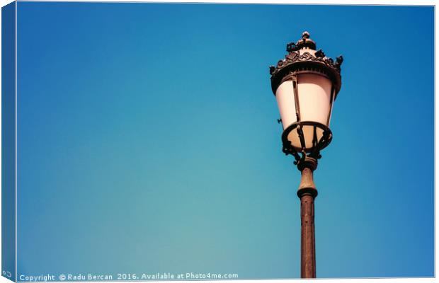 Vintage Street Lamp On Blue Sky Canvas Print by Radu Bercan