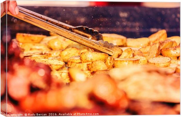 Preparing Grilled Potatoes On Barbecue Canvas Print by Radu Bercan