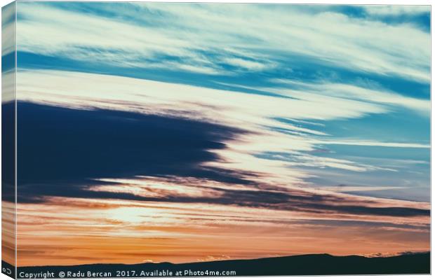 Beautiful Sunset Cloudy Sky Over Mountains Canvas Print by Radu Bercan