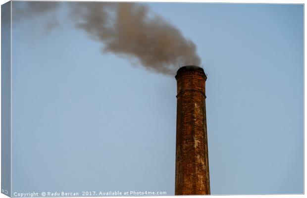 Industry Smoke Pollution From Factory Chimney Canvas Print by Radu Bercan