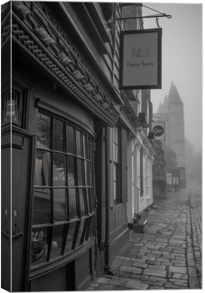 Urban Echoes: A Monochrome Narrative Canvas Print by Rob Lucas