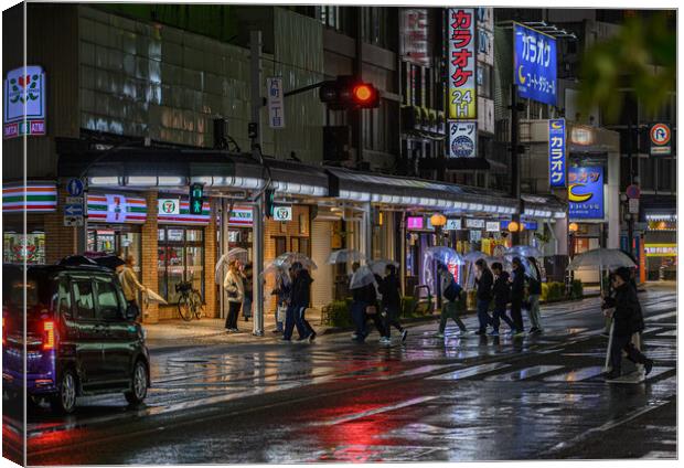 Late night dash in the rain to the Seven 11 Canvas Print by Rob Lucas