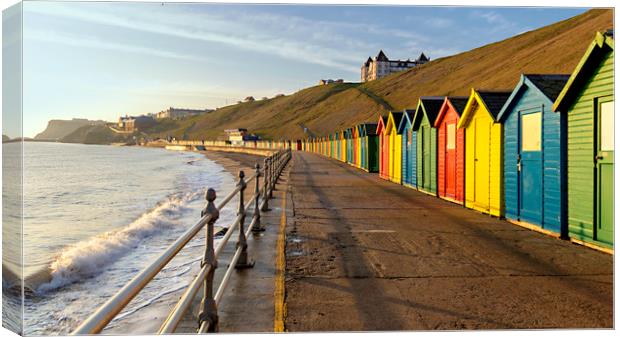 Whitby beach huts Canvas Print by Kevin Elias