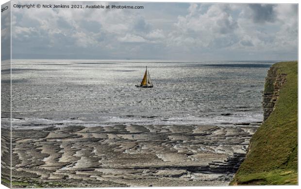 Yacht crossing infront of Nash Point Beach  Canvas Print by Nick Jenkins