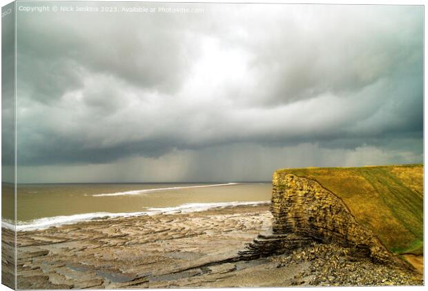 A stormy sky over Nash Point Glamorgan Heritage Coast Canvas Print by Nick Jenkins