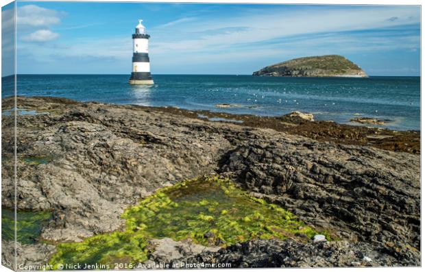 Penmon Lighthouse off the Coast of Anglesey Canvas Print by Nick Jenkins