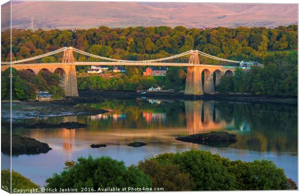 Sunset on the Menai Bridge from Anglesey Canvas Print by Nick Jenkins