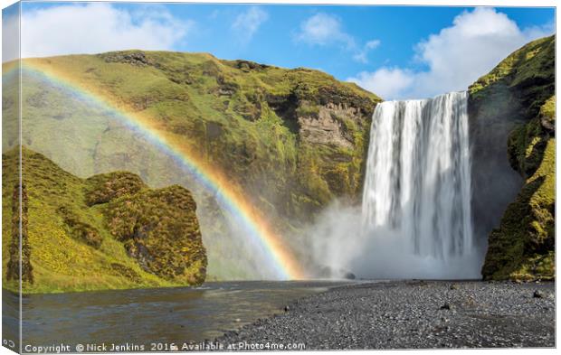 Skogafoss Waterfall and Rainbow south Iceland Canvas Print by Nick Jenkins