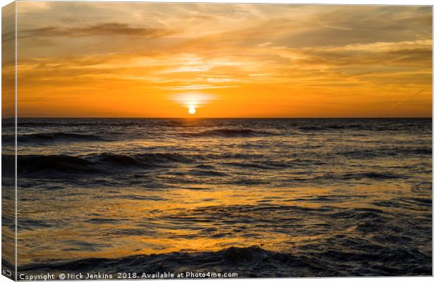 The Sun Setting over Llantwit Major Beach Glamorga Canvas Print by Nick Jenkins