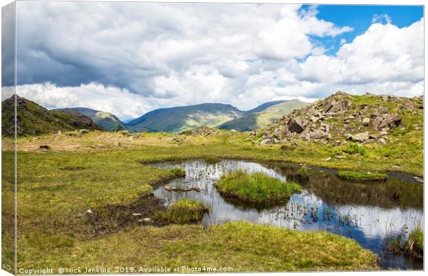 Small tarn near Huntingstile Crag Lake District Canvas Print by Nick Jenkins