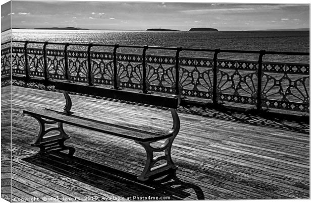 Bench on Penarth Pier Canvas Print by Nick Jenkins