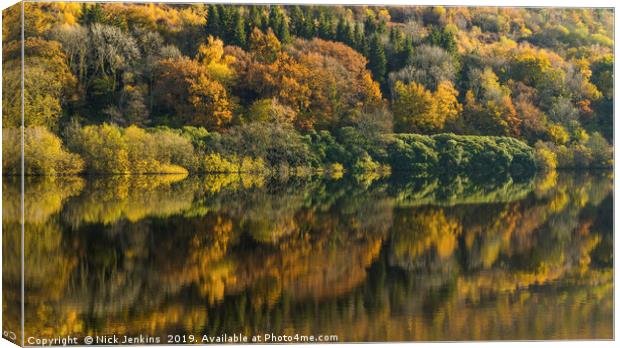 Trees reflected in Talybont Reservoir Brecon Beaco Canvas Print by Nick Jenkins