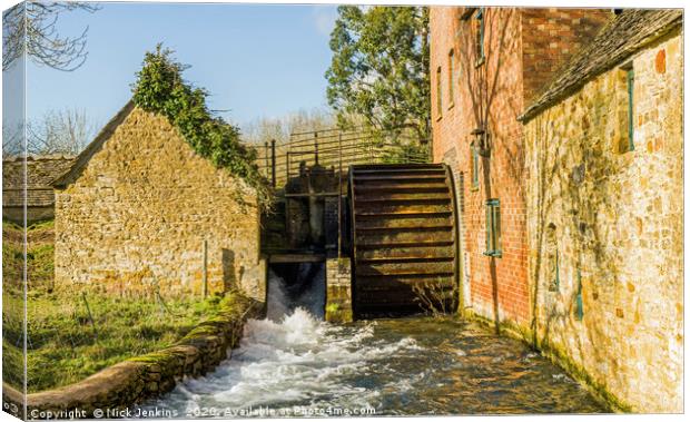 The Old Mill Lower Slaughter in February Canvas Print by Nick Jenkins