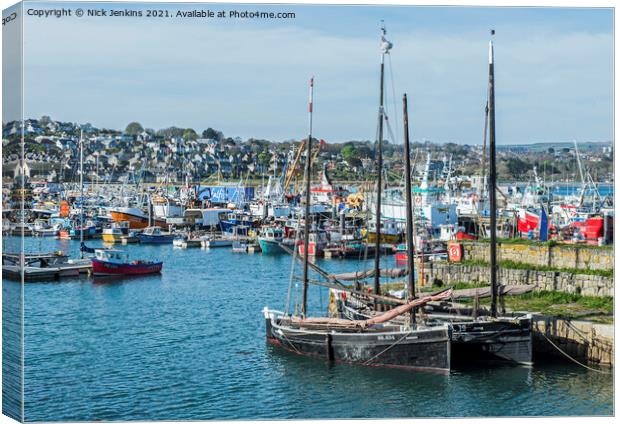 Newlyn Harbour with boats of all shapes and sizes  Canvas Print by Nick Jenkins