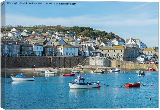 Coastal village of Mousehole across the harbour Canvas Print by Nick Jenkins