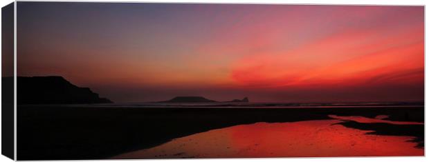 Rhossilli sunset Canvas Print by Paul Fine